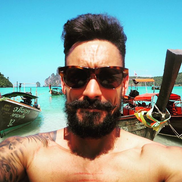 My final #JFMDecembeard selfie but this time it\'s in Thailand on Koh Phi Phi ☀️ Things I have learnt during #Decembeard 1. @Justformenuk makes my beard look fuller and thicker using their Moustache & Beard Dye and was the first product in my travel backpack! .2. It takes 3 weeks to get over the itchy stage! .3. A beard is a massive talking point .4. Patchy, grey, curly is fine it just gives your beard more personality!!! What have you learnt, I would love to here your beard stories and pictures  you can check out my Decembeard progress via carlthompson.co.uk  #beard #beardgame #grooming #dappermen #dapperday #lifestyle #beach #kohphiphi #thailand #inked #tattoedmen #tattoo #inkedup #instastyle #mensgrooming #menswear by @hawkinsandshepherd